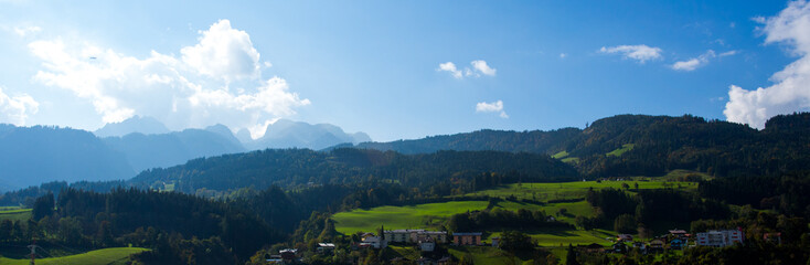 Bright green meadows and blue sky