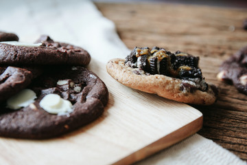chocolate chip cookies on old wooden background