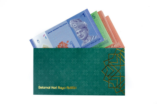 'Duit Raya' is money given from adult to children during Eid al-Fitr celebration in Malaysia. This is a Malay tradition and regarded as alms to the children.