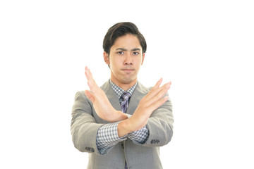禁止の意思表示をする男性