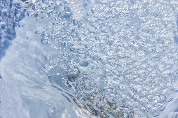 Abstract water flowing with bubbles