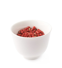 Cup filled with the pepper seeds