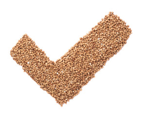 Tick shape made of buckwheat seeds