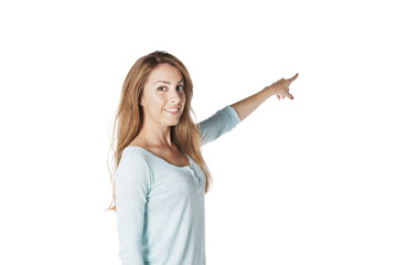 Portrait of young woman pointing