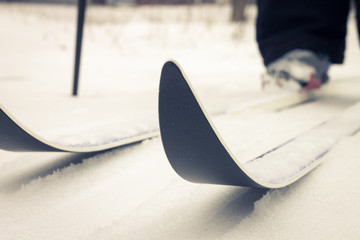 Pair of ski on snow trace . Toned image