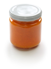 homemade apricot jam isolated on white background