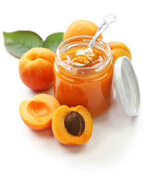 homemade apricot jam on white background