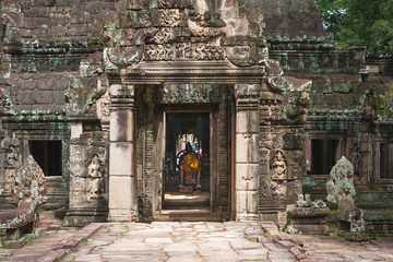 Fototapeta na wymiar Stone murals and sculptures in Angkor wat, Cambodia