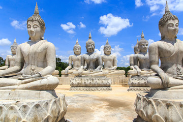 Fototapeta na wymiar Buddha statue and blue sky, Nakhon Si Thammarat Province, Thailan