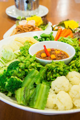 Set of fresh vegetables and spicy sauce