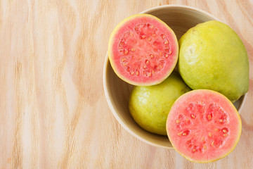 Fresh goiaba on wooden table