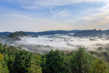 Layer of mountains in the mist at sunrise time, Baan Nai Wong, Ranong Province, Thailand