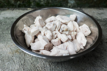 Boil chicken breasts in a bowl