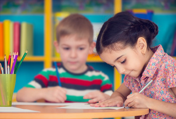 Beautiful little girl at school
