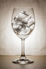 Wine glass with ice in warm tone