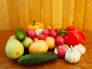 set fresh vegetables on wooden table