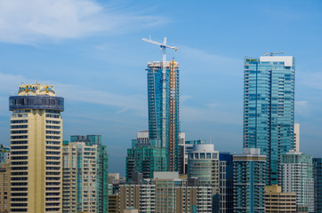 The skyline of Vancouver features luxury condominiums as well as office buildings and international hotels including construction on the new Trump Tower.