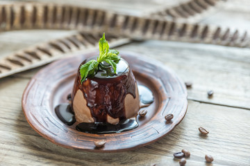 Coffee panna cotta under chocolate topping