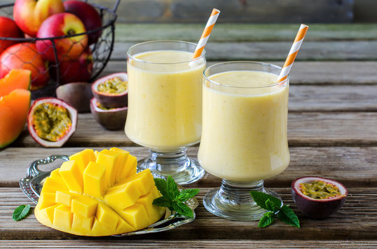 Tropical mango and passion fruit smoothie for healthy breakfast