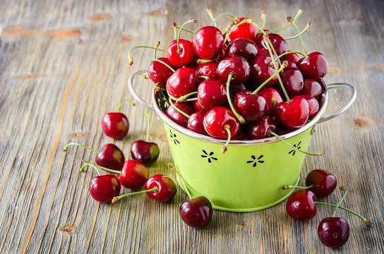 Sweet red ripe cherries in bowl