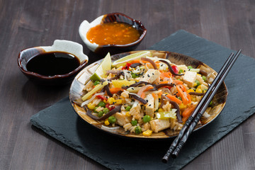 fried rice with tofu, vegetables and sauces