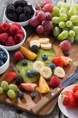 ingredients for fruit salad, vertical