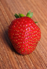 Fresh strawberry on wooden table