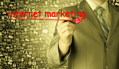 business man writing internet marketing