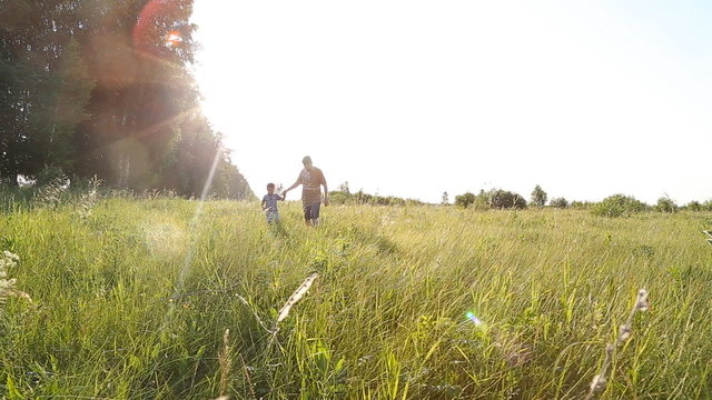 Family fun - father and his son up in the air