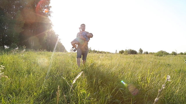 Family fun - father and his son up in the air