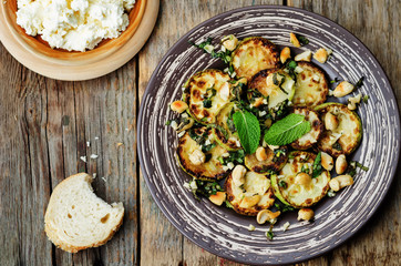 zucchini Basil mint cashews salad with ricotta and fresh bread