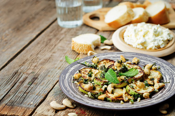 zucchini Basil mint cashews salad with ricotta and fresh bread