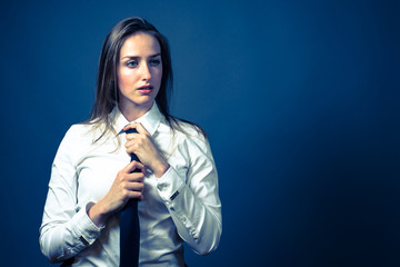 American Woman In White Shirt & Tie