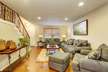 Cozy living room with hardwood floor.