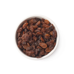 Cup filled with raisins isolated