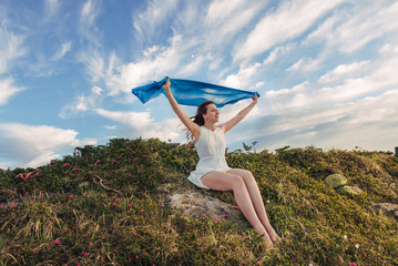 Happy woman feel freedom and enjoying the nature