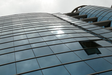  Reflection in windows of modern office building