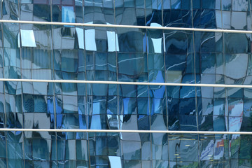  Reflection in windows of modern office building