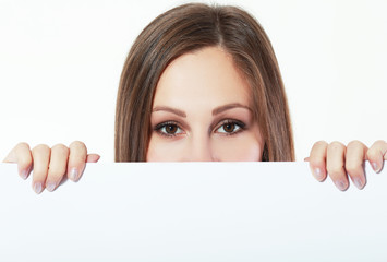 woman behind board
