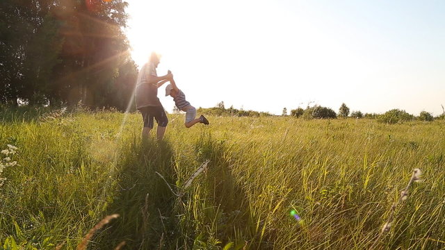Family fun - father and his son up in the air