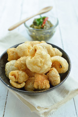Pork rinds also known as chicharon or chicharrones, deep fried p