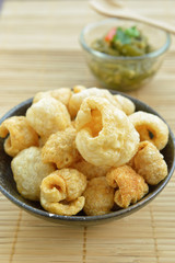 Pork rinds also known as chicharon or chicharrones, deep fried p