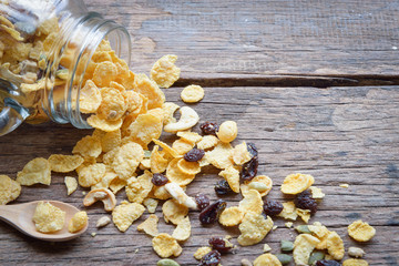 Corn flakes bran and raisin cereal with nut and grain in mason j