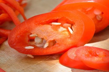 Sliced Chili Pepper on wooden chopping board