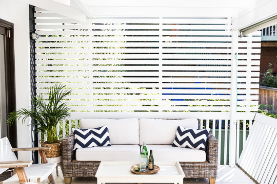 Stylish contemporary outdoor covered seating area in a garden