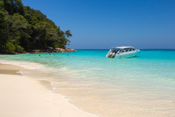 Beautiful sea landscape with tropical coast and the high-speed boat at Tachai island, Phang nga, Thailand