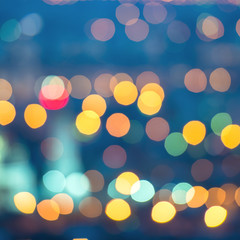 abstract blue circular bokeh background, city lights with horizo