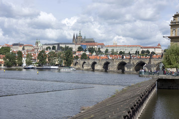 Obraz premium Spring Prague gothic Castle with the Charles Bridge