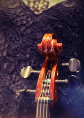 old cello played by a woman