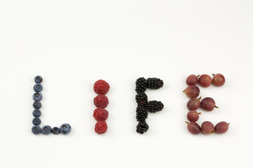 Life written with fruits
